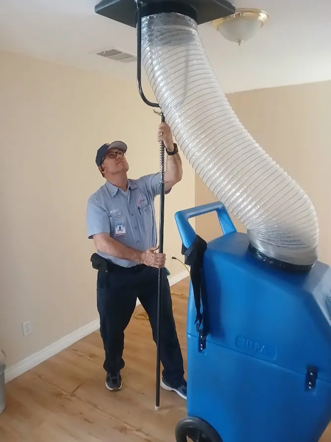 HVAC Installation technician using HEPA equipment in Badger